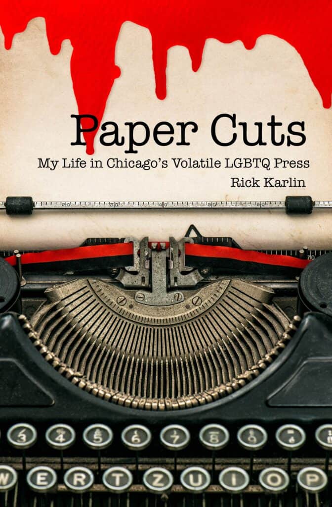 Paper Cuts Front Cover featuring a bloody typewriter